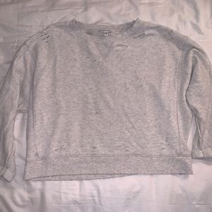 Grey cropped, distressed sweatshirt